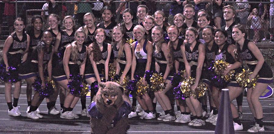 The WSHS Varsity cheer team pose for a picture at the football game.