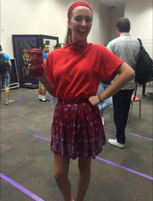 Junior Christine Cassen is dressed in red for the first day of homecoming week.
